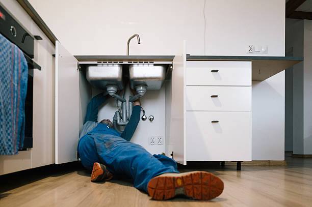 Professional Emergency Plumber technician working in University Park, MD